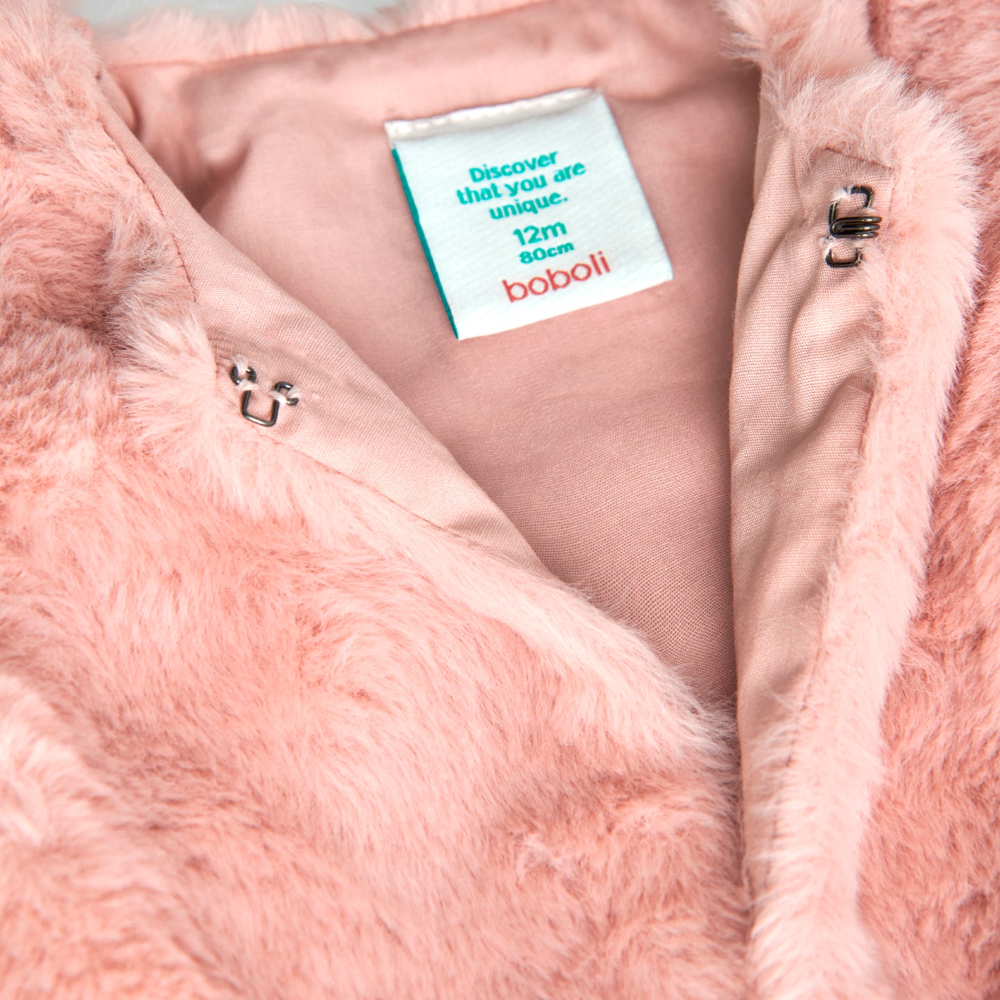 Gilet ecopelliccia rosa cipria per bambina