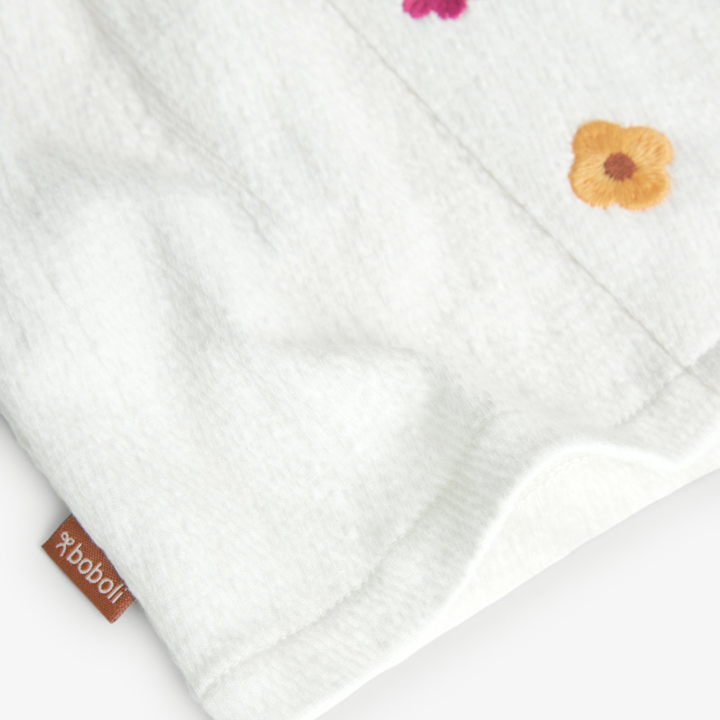 Maglietta in maglia per bambina bianca fiori