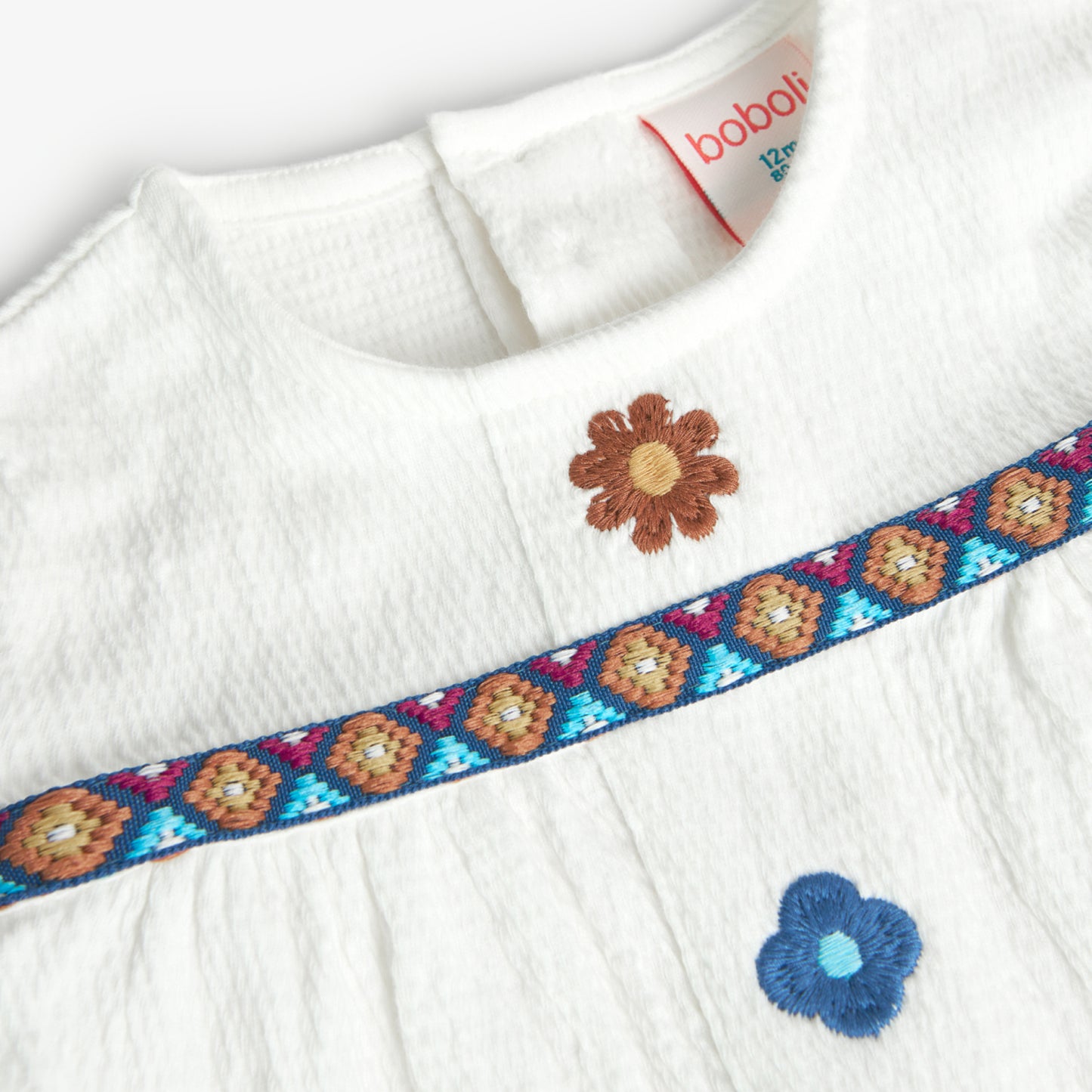 Maglietta in maglia per bambina bianca fiori