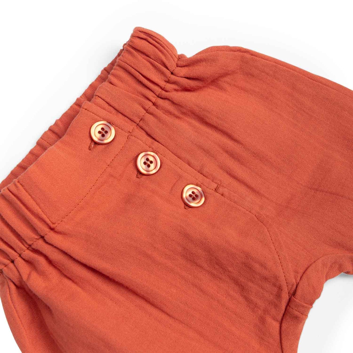 Pantaloncini Moulin Roty arancioni 100% mussola di cotone