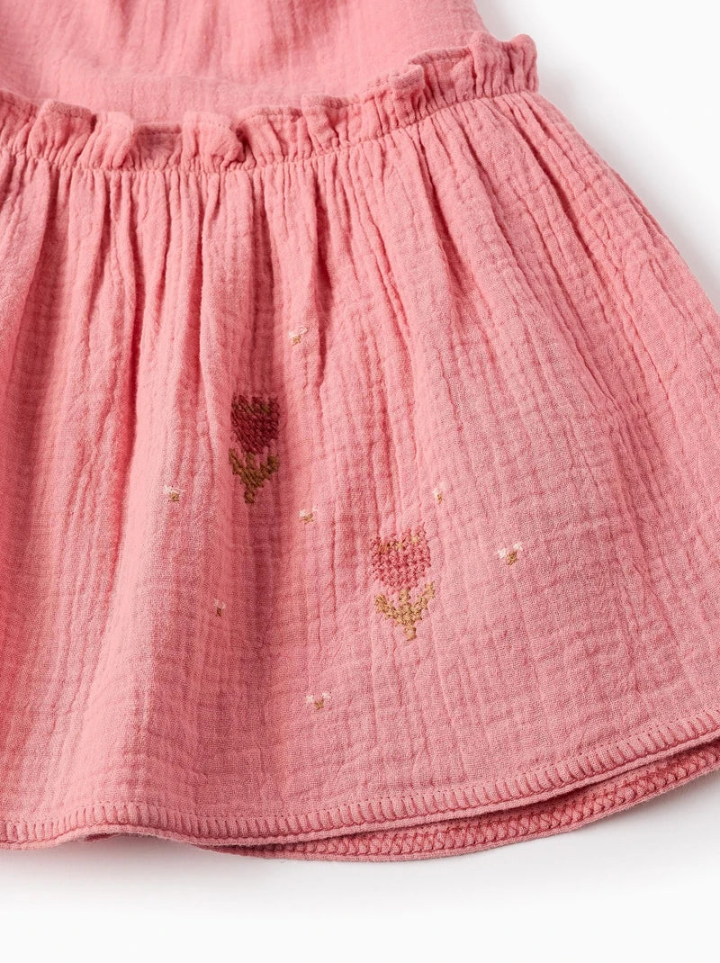Abito rosa antico in cotone con fiori ricamati a punto croce